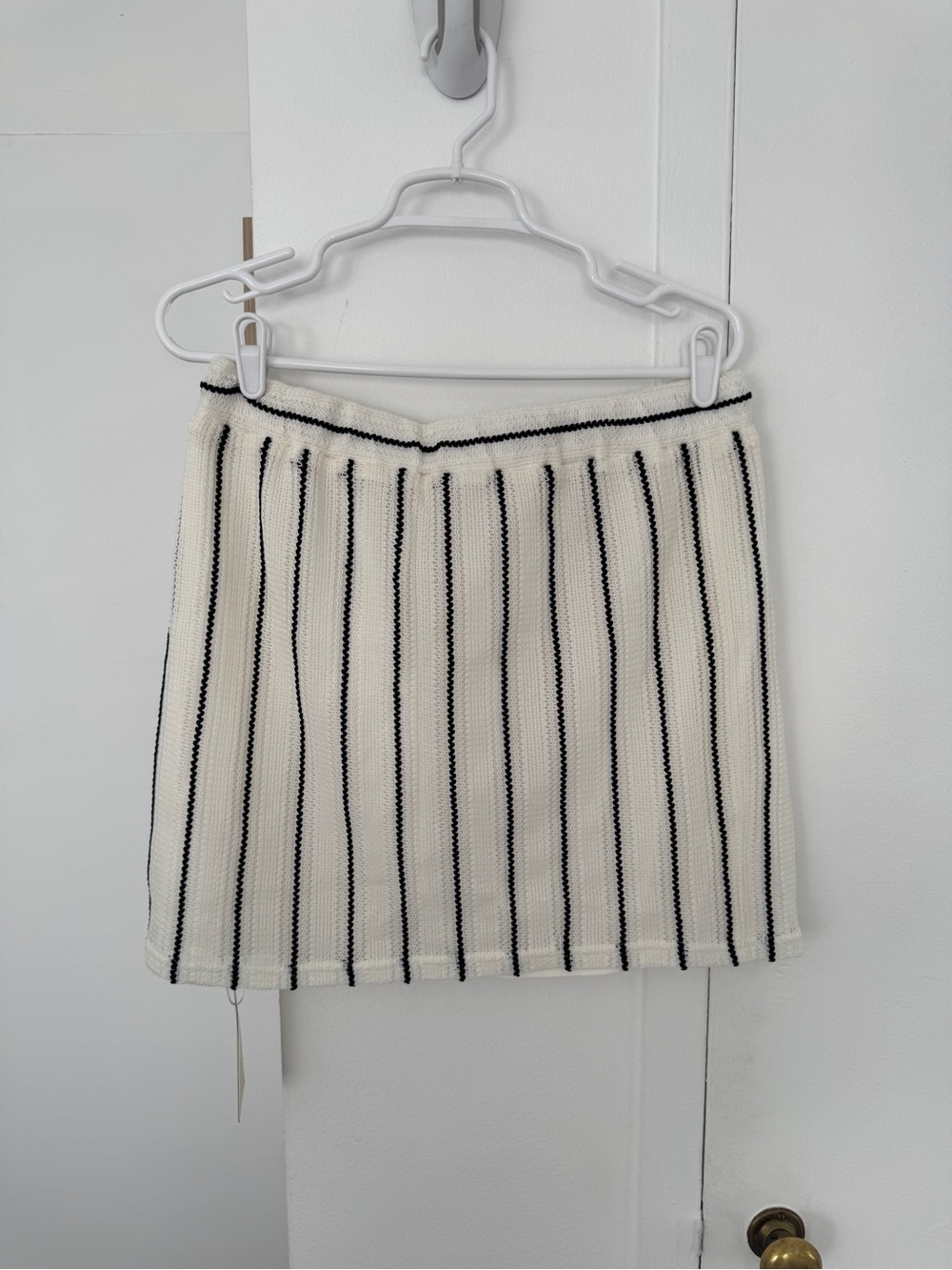 HALARA Cream Mini Skirt with Black Vertical Stripes